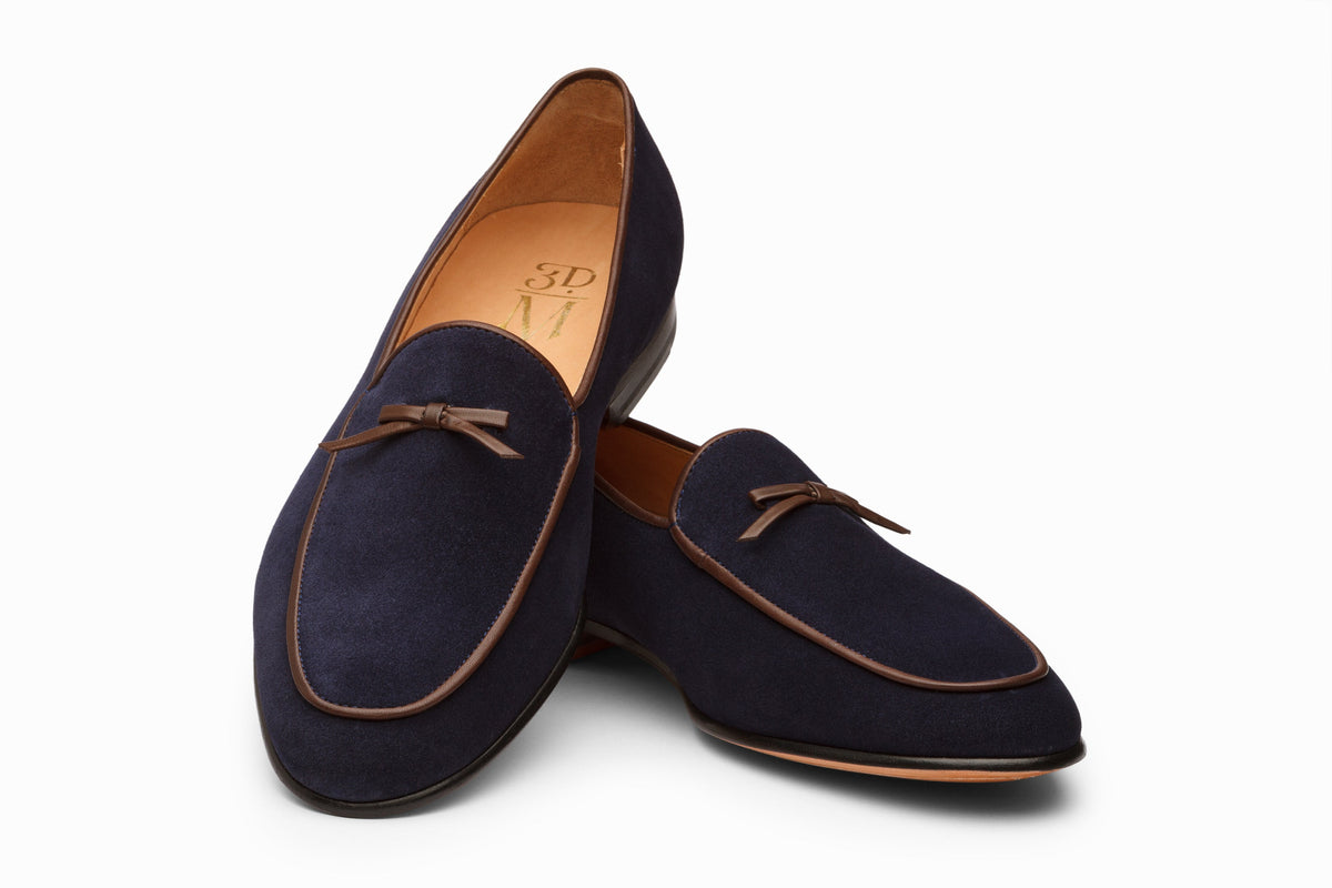 Navy suede Belgian loafer three-quarter rear view showing heel