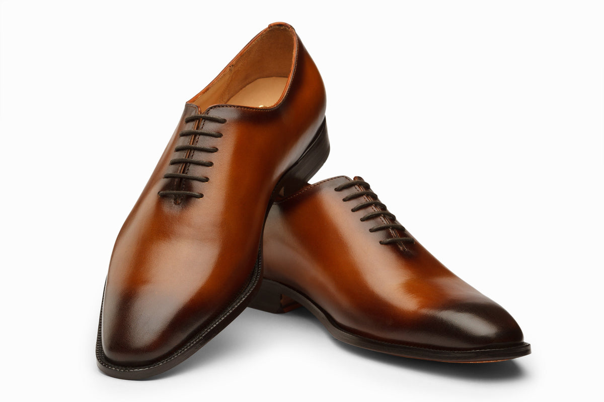 Tan brown patina wholecut Oxford rear heel view
