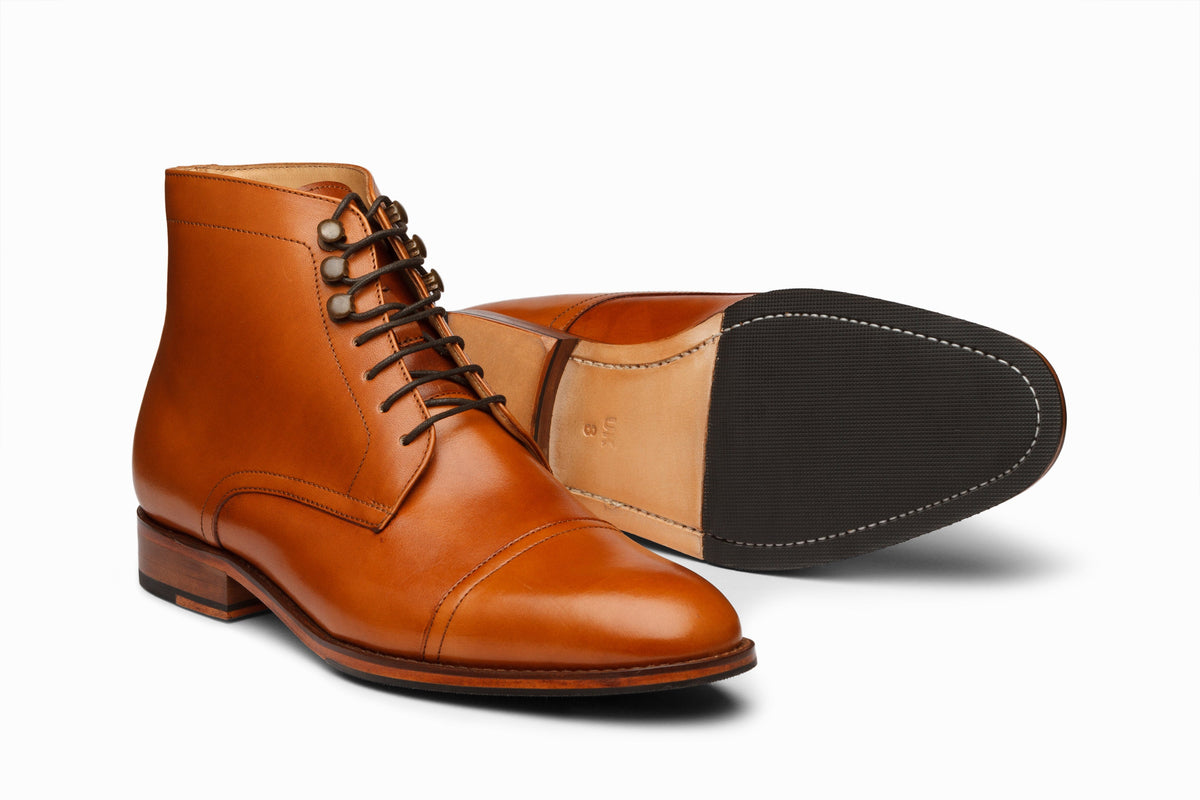 Tan toecap derby boot rear heel view showing lace-up construction