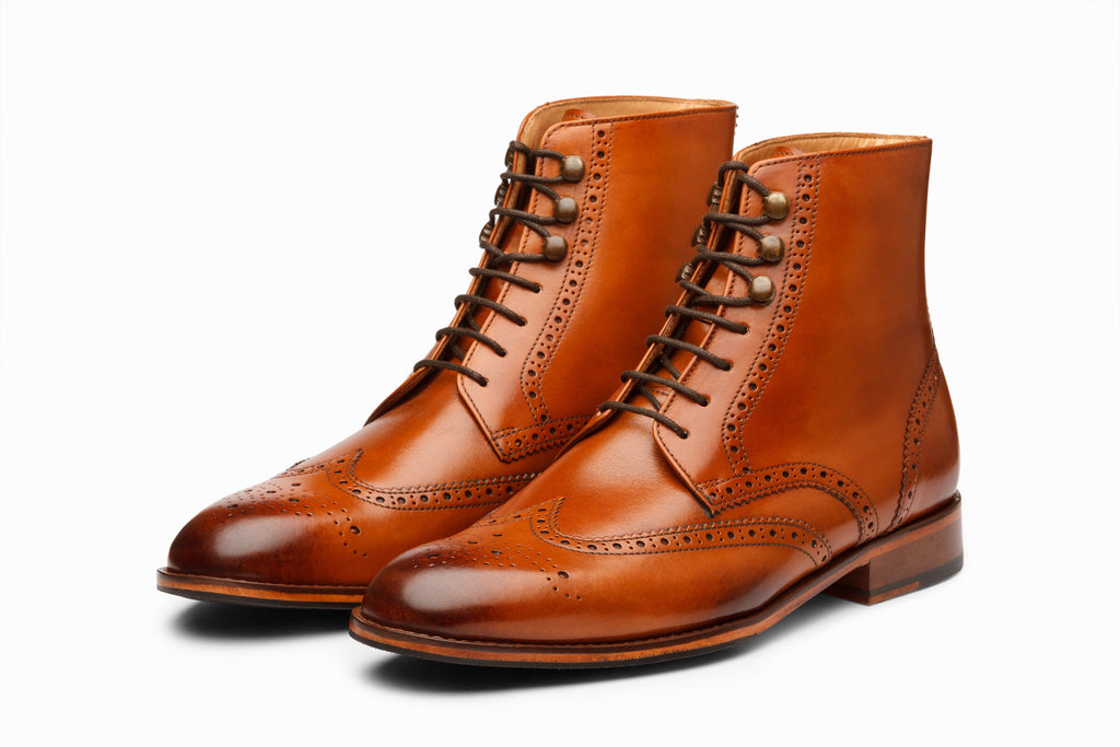 Wingtip Brogue Boot Tan side profile view on white background