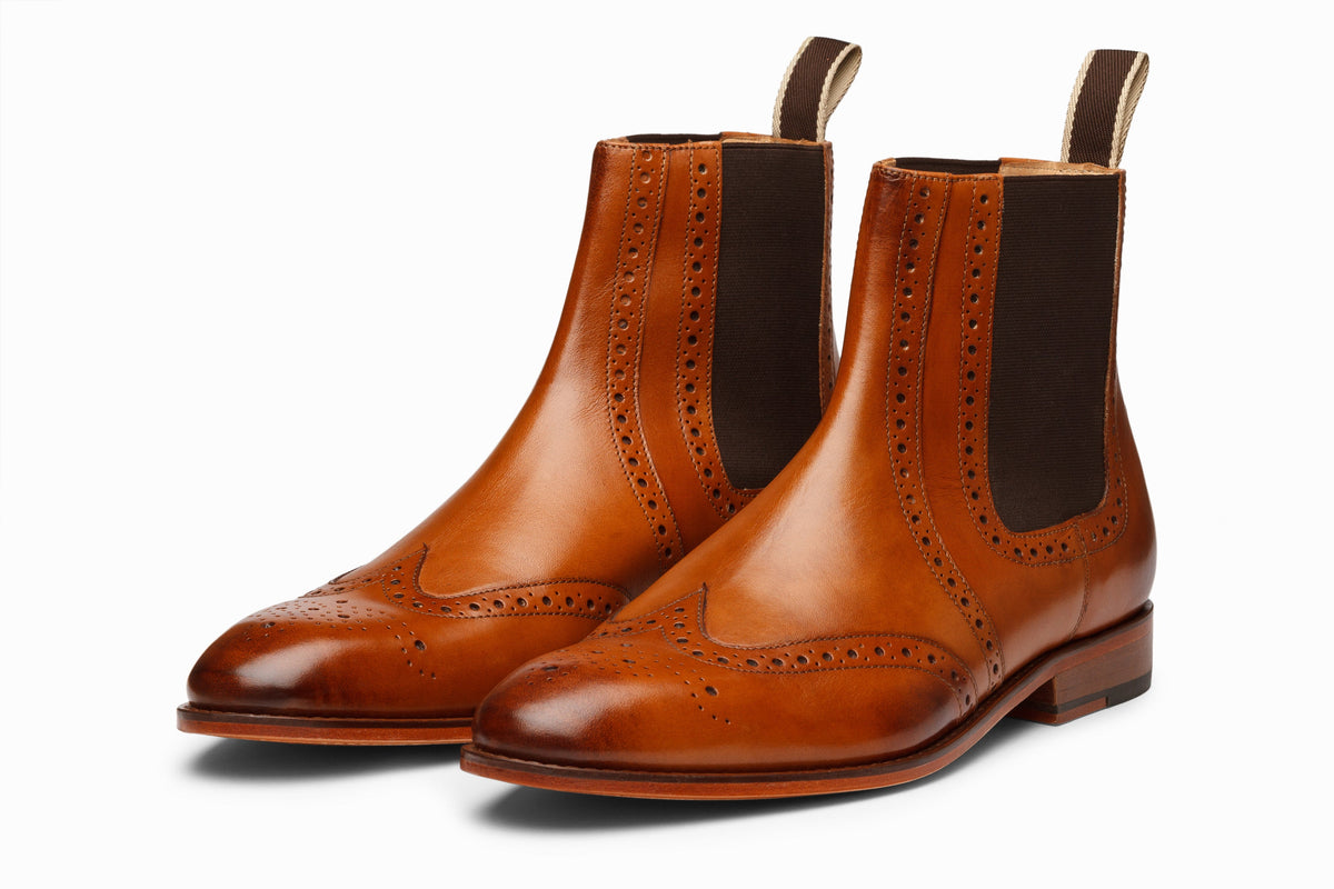 Wingtip Chelsea Brogue Boot Tan side profile view on white background