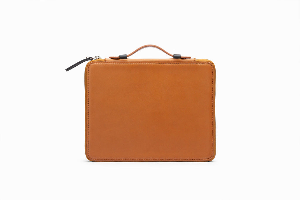 Tan leather iPad case front view showing structured calfskin exterior