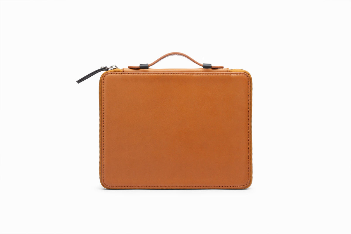 Tan leather iPad case front view showing structured calfskin exterior