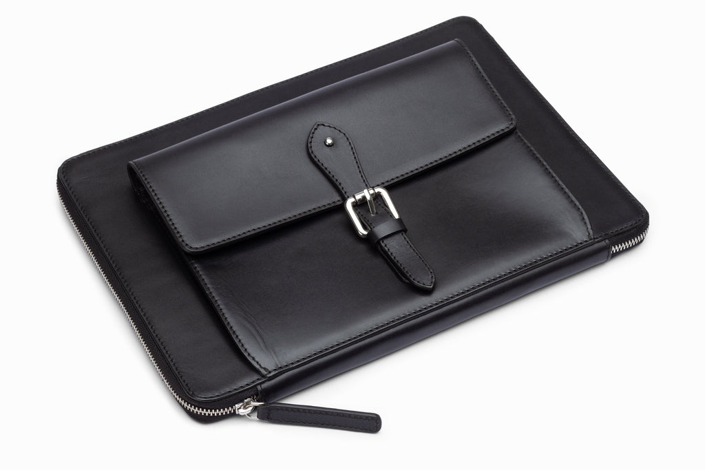 Black leather laptop sleeve side profile showing slim construction