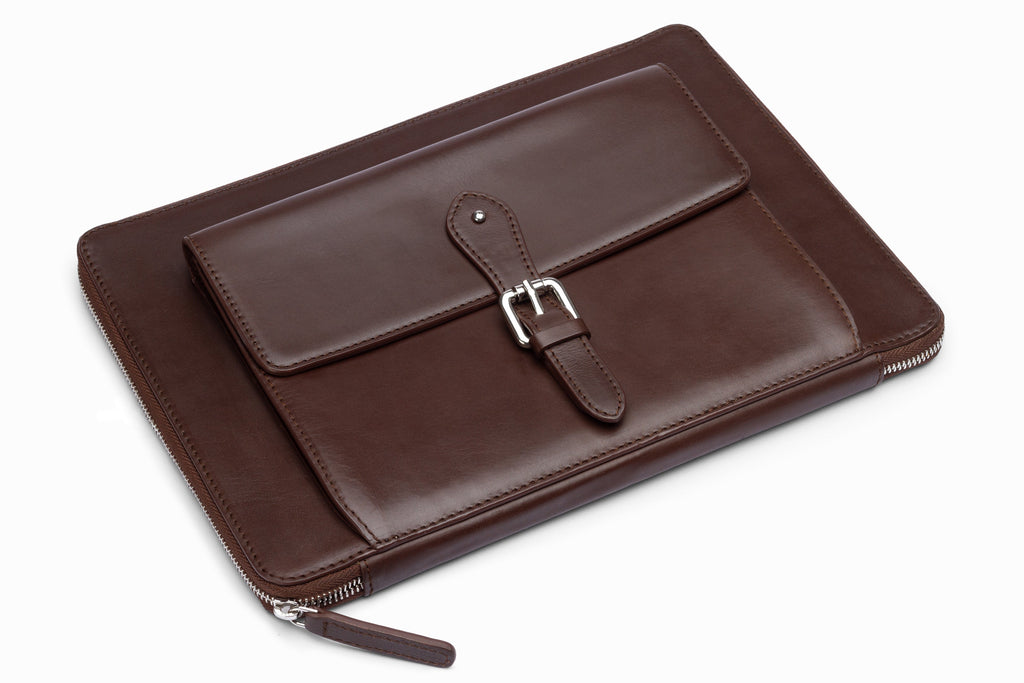Dark brown leather laptop sleeve side profile showing slim construction
