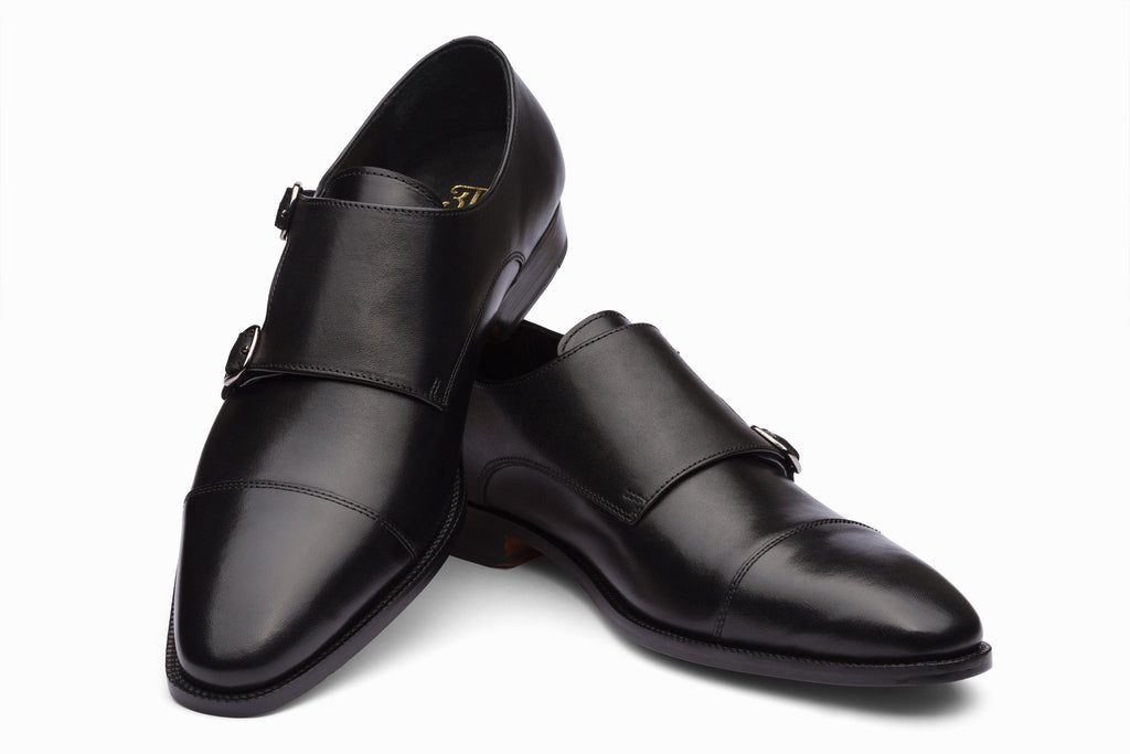 Toecap Double Monks Black three-quarter rear view showing heel counter