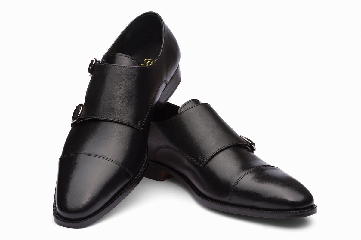 Toecap Double Monks Black three-quarter rear view showing heel counter