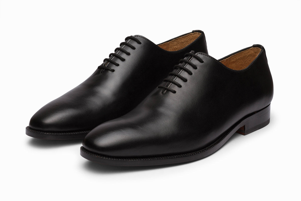 Wholecut Oxford Black three-quarter front view on white background
