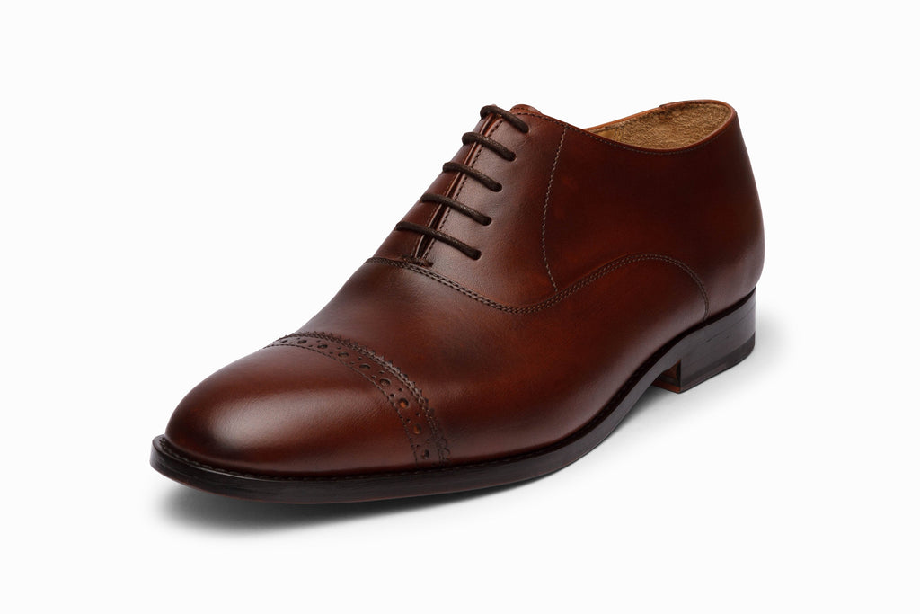 Brown quarter brogue Oxford three-quarter rear view showing heel counter