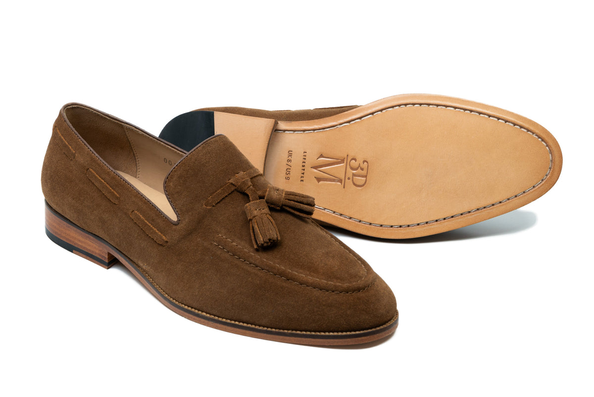 Tobacco suede tassel loafer side profile showing suede texture and tassel