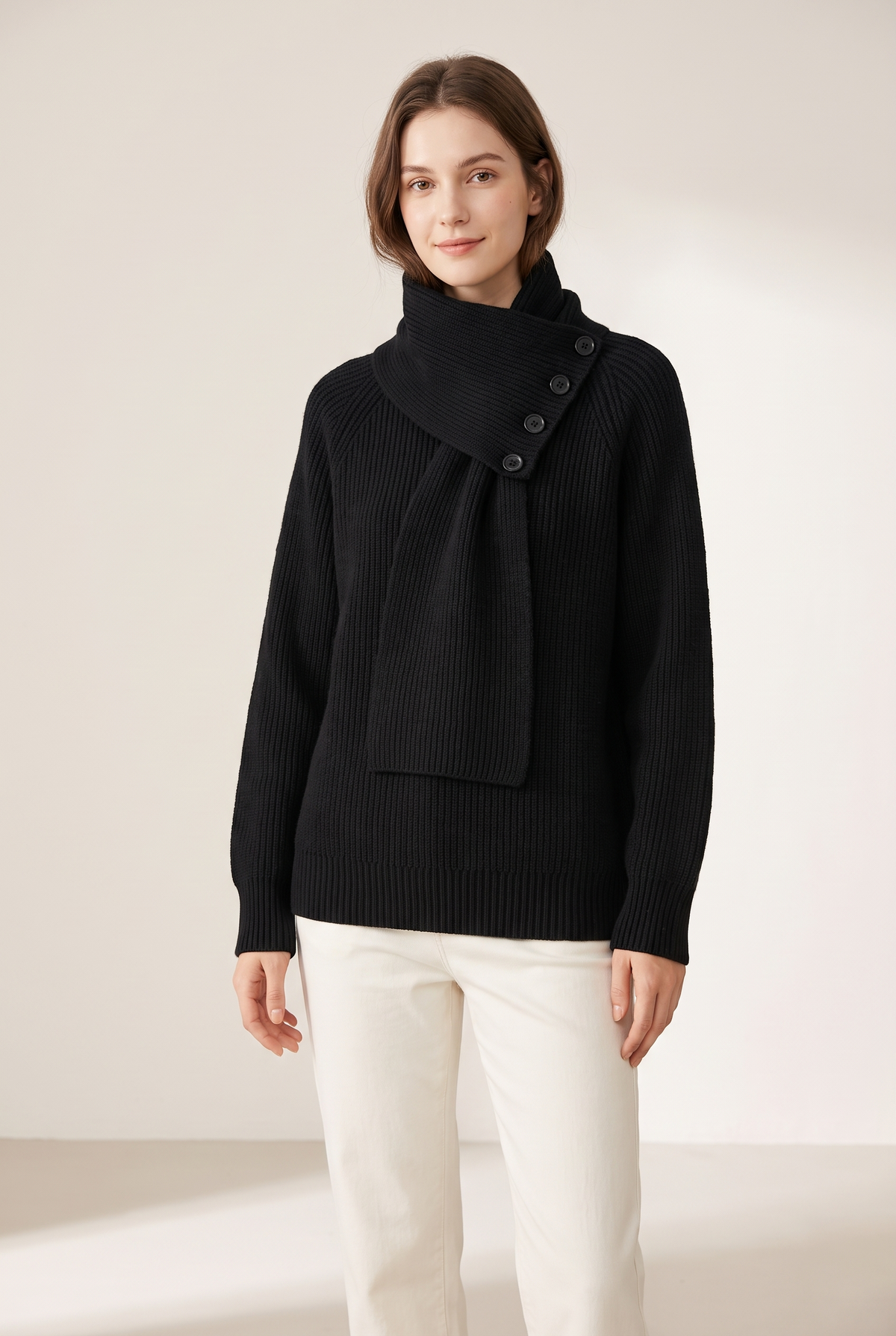 Josephine Women's Asymmetric High Neck Button Details Ribbed Knit Sweater in Black, on model