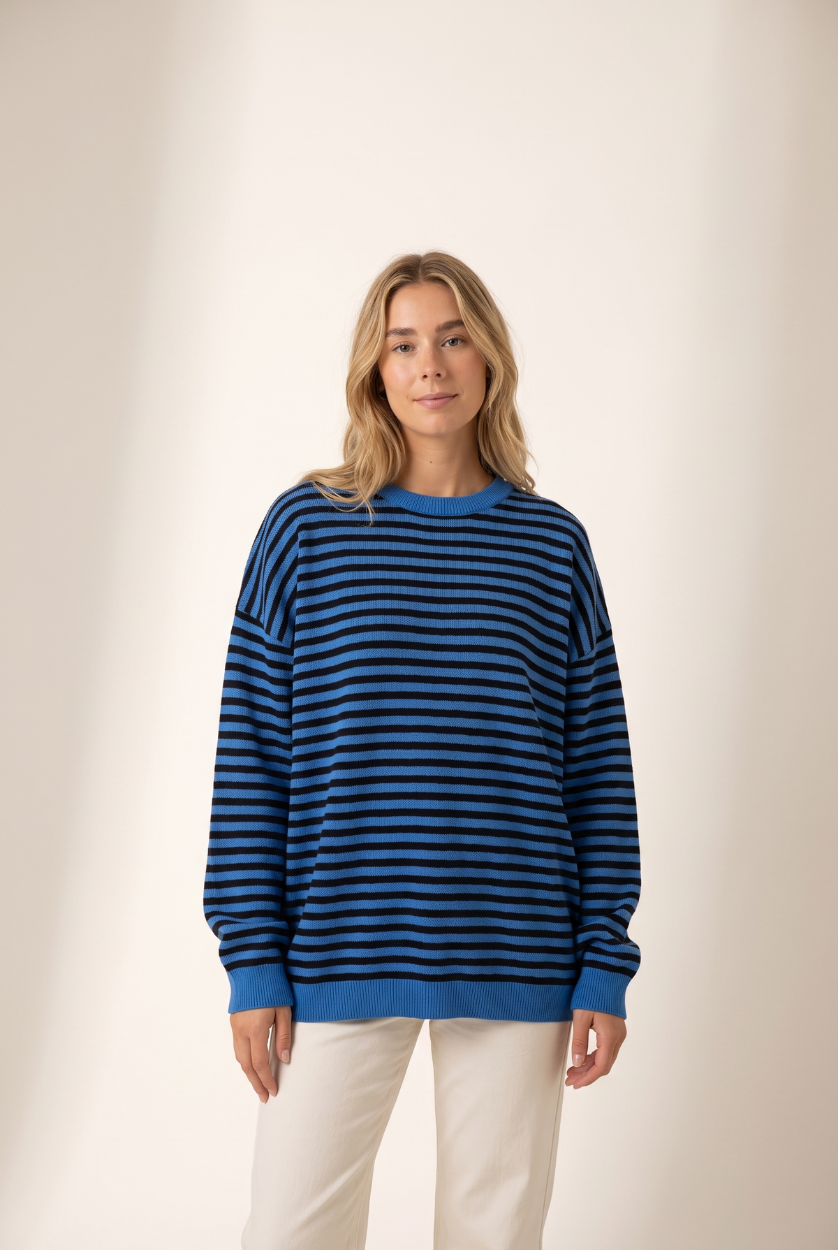 Women's Striped Oversized Fit Sweater in Blue & Black, on model