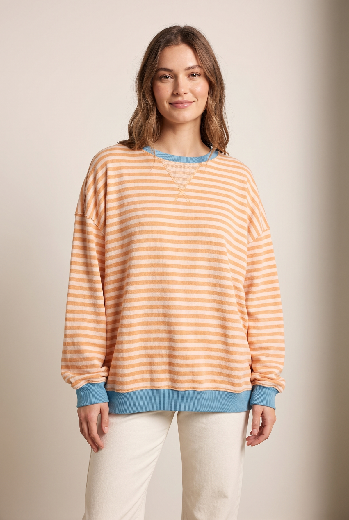 Women's Striped Oversized Fit Sweater in Orange Stripes, on model