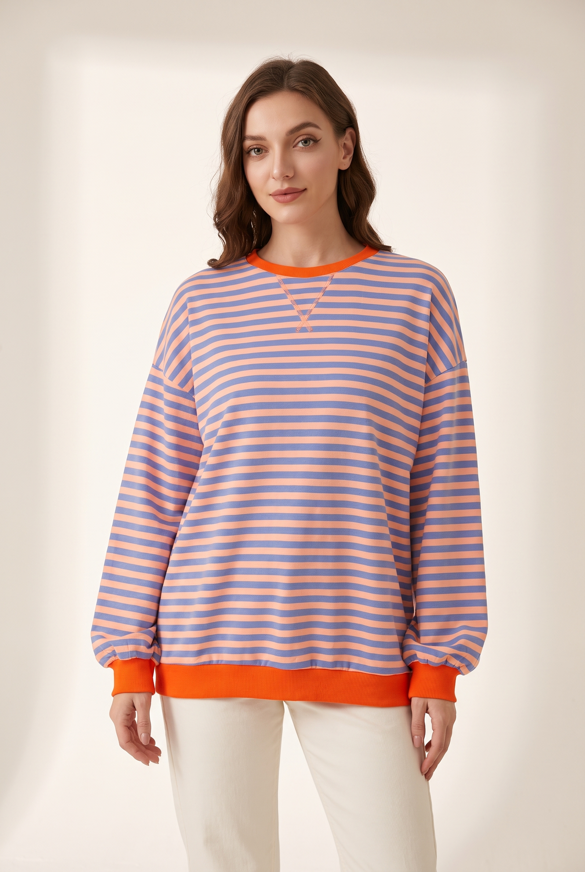 Women's Striped Oversized Fit Sweater in Orange & Blue, on model