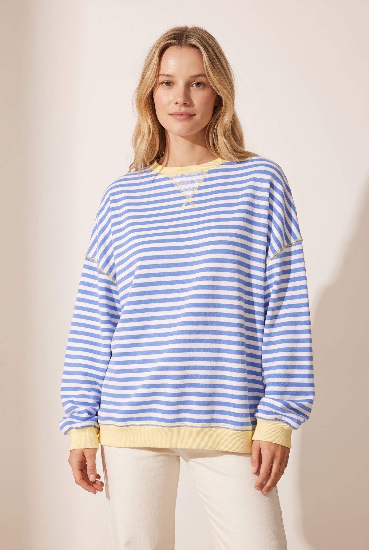 Women's Striped Oversized Fit Sweater in Sky Blue, on model