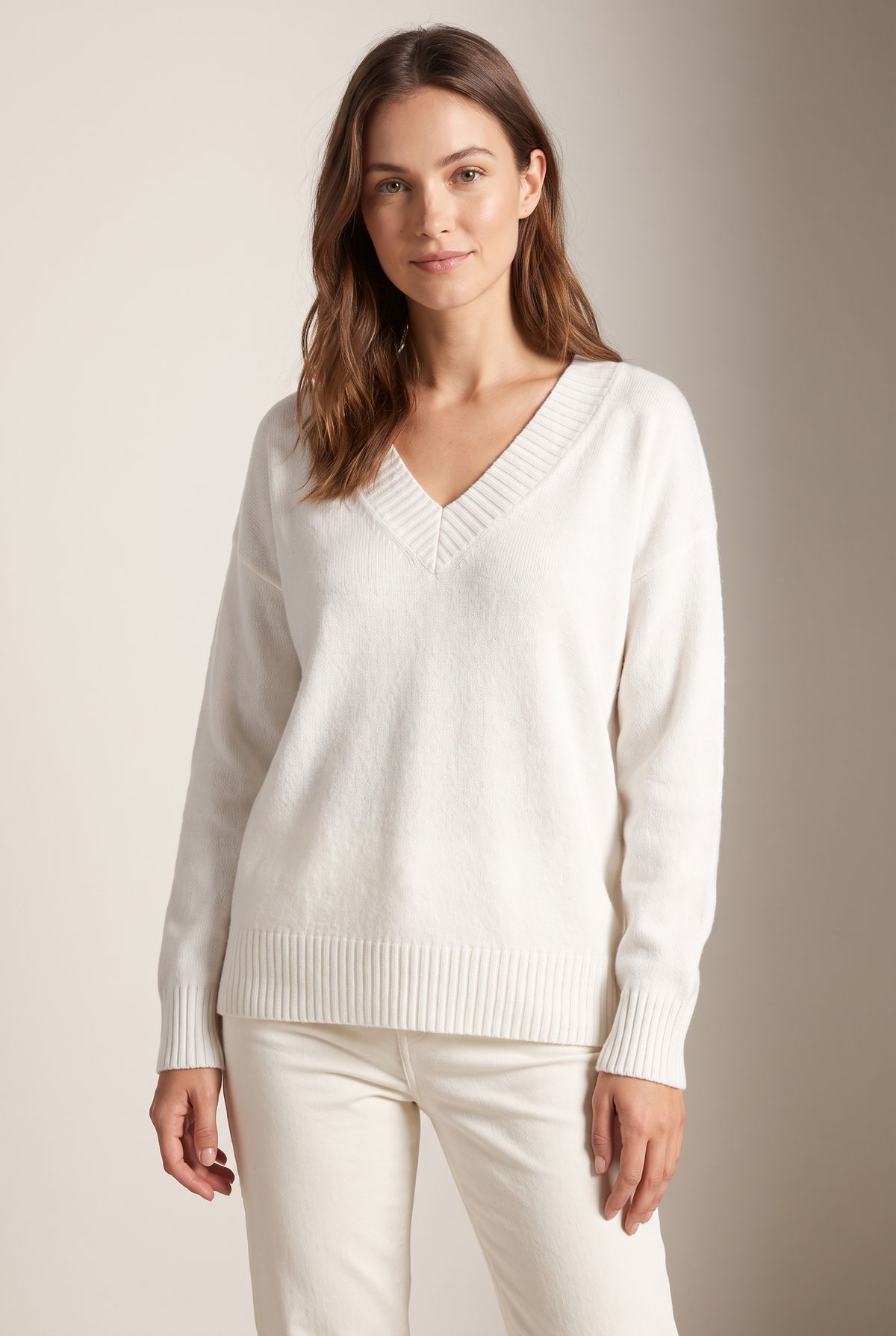 Women's Soft-Knit V-Neckline Ribbed Cuff Detail Sweater in White, on model