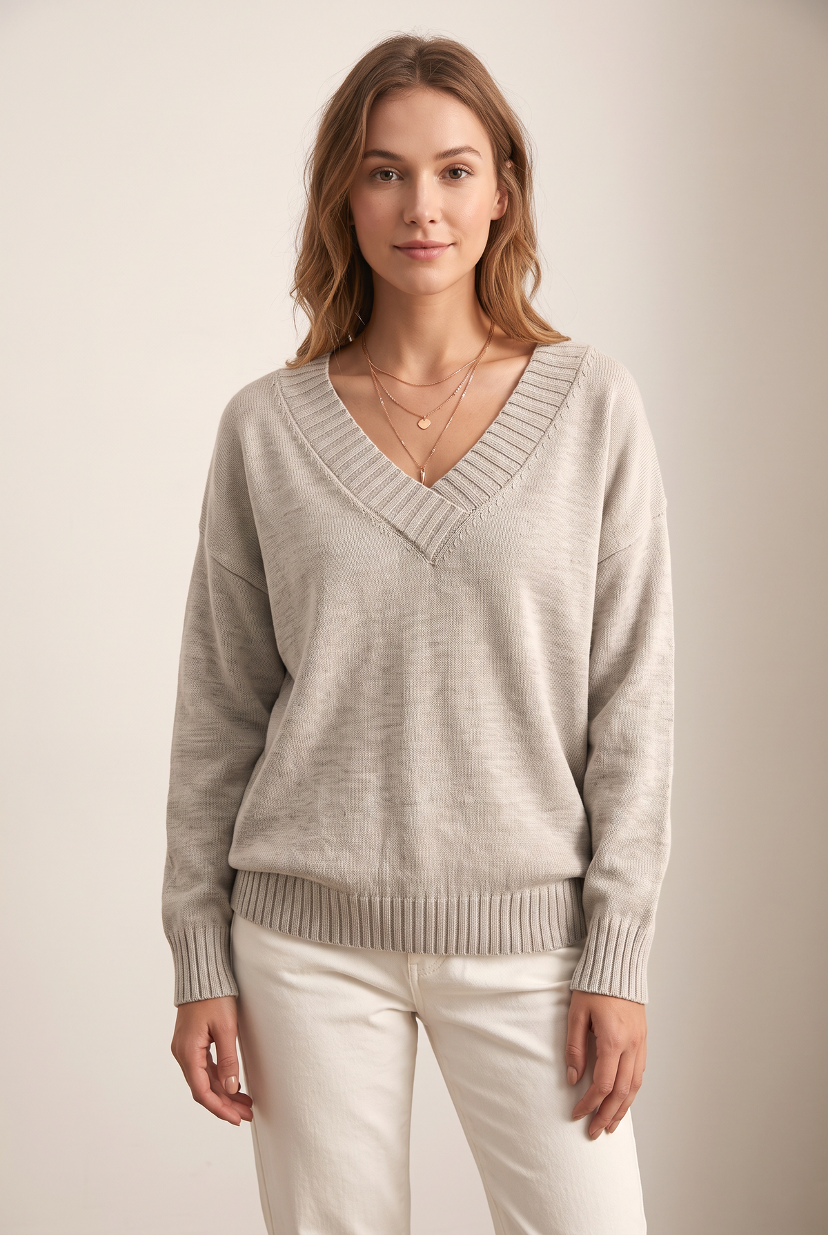 Women's Soft-Knit V-Neckline Ribbed Cuff Detail Sweater in Beige, on model