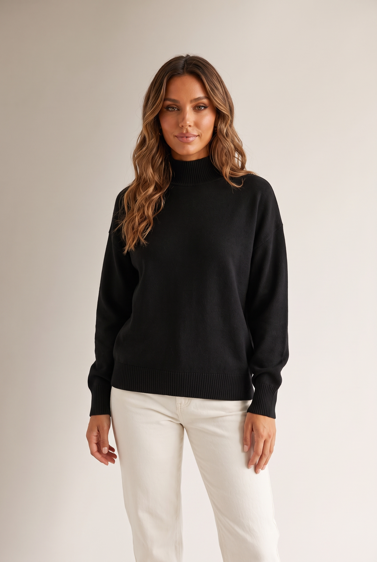Lena Women's Relaxed Knit Turtleneck Sweater in Black, on model