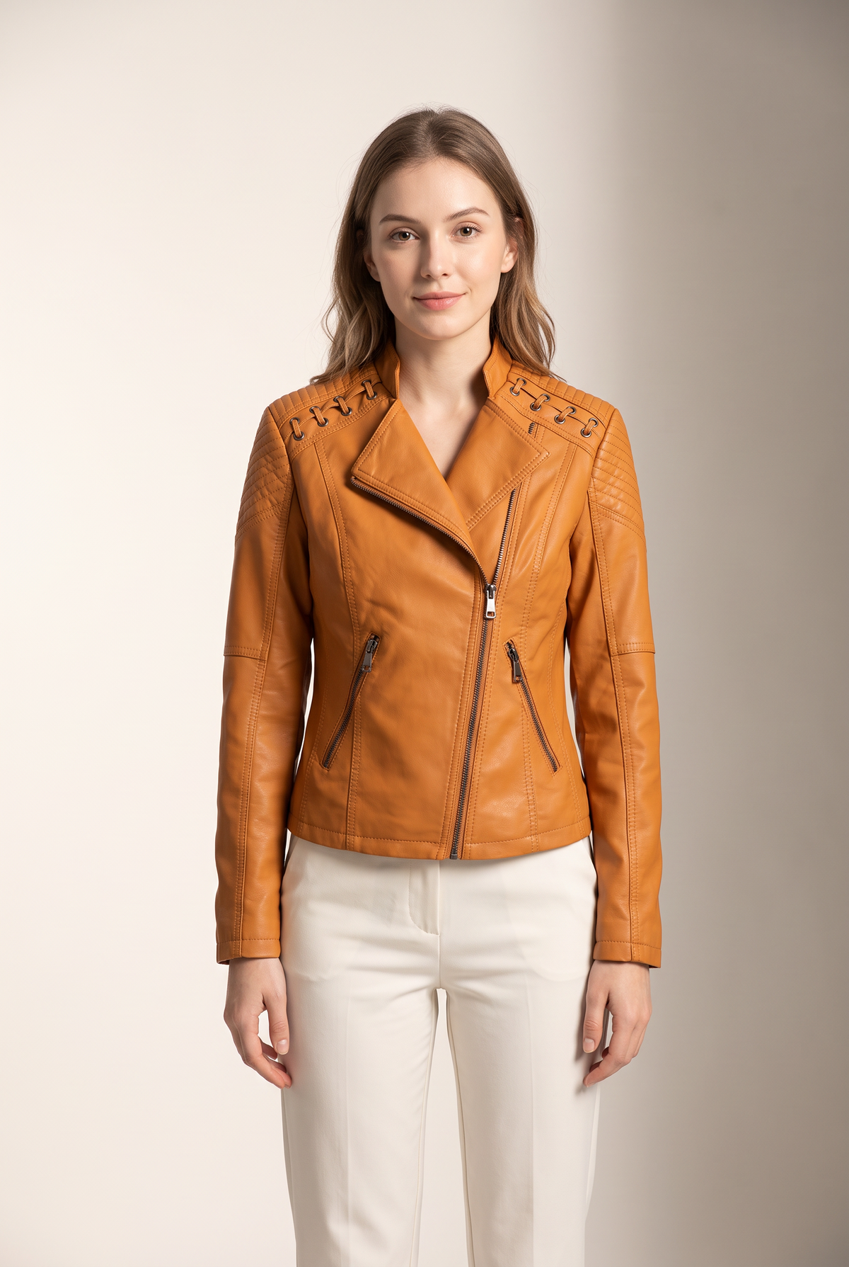 Jenny Women's Moto-Style Zip-Up Faux Leather Biker Jacket in Orange, on model
