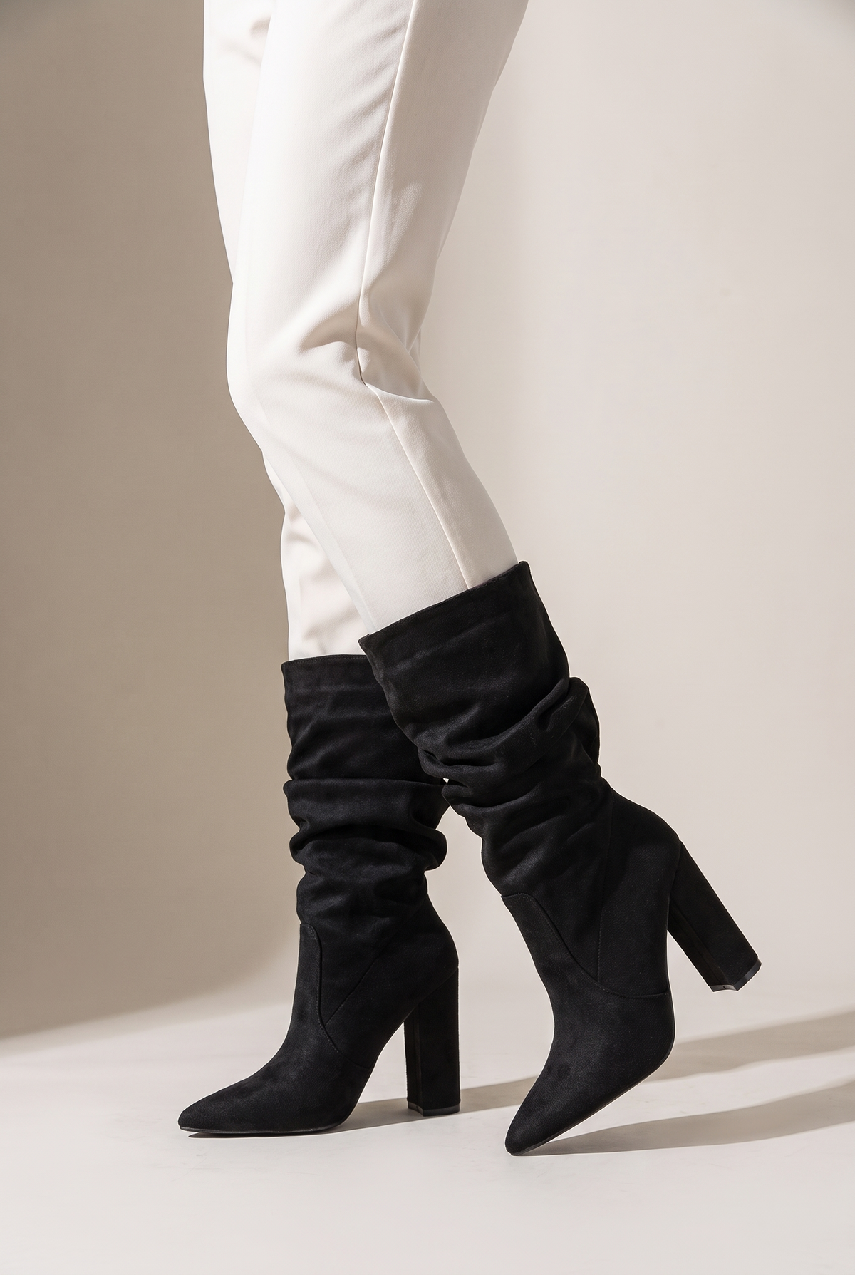 Women's Winter Faux Suede Boots Gathered Shaft in Black, on model