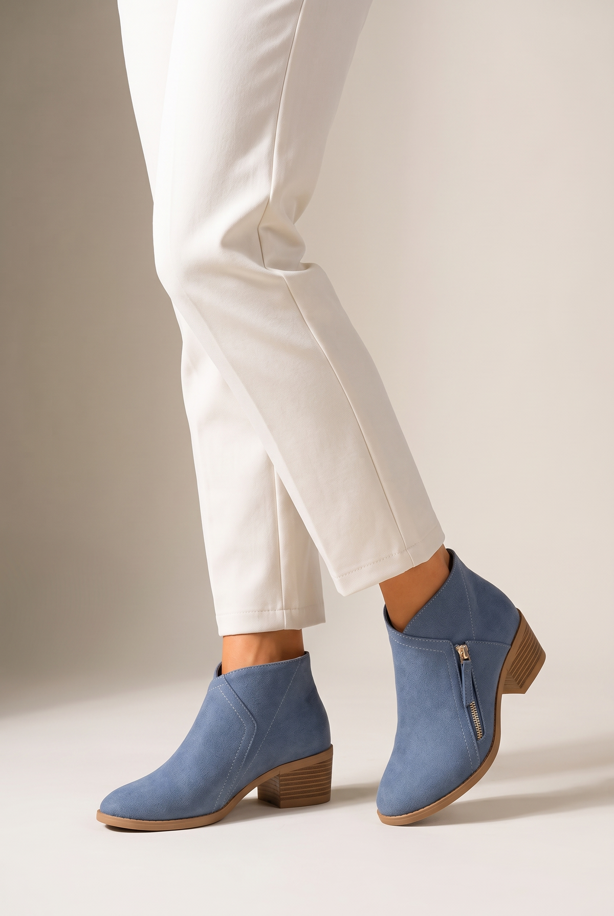 Sophie Women's Faux Suede Low-Heel Side-Zip Chelsea Boots in Blue, on model
