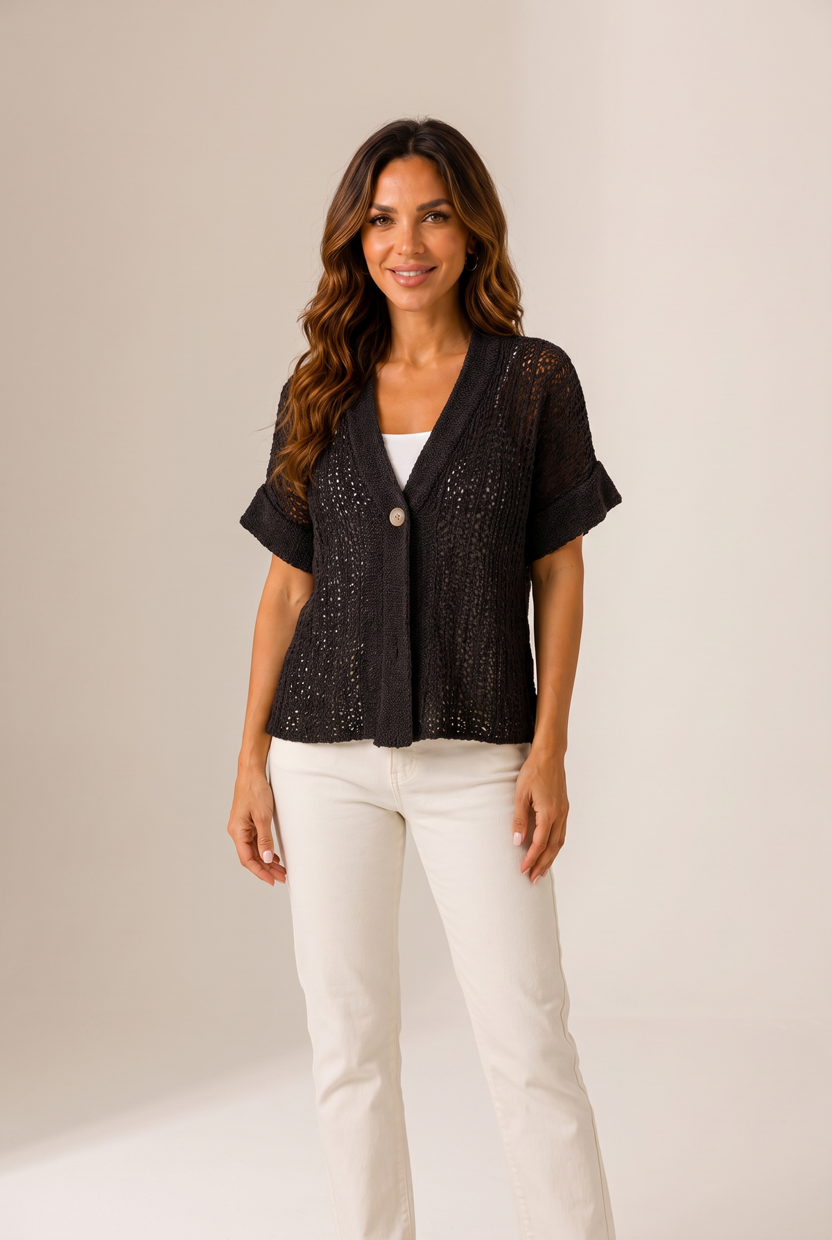 Livia Women's Open Knit Button Cardigan Top in Black, on model