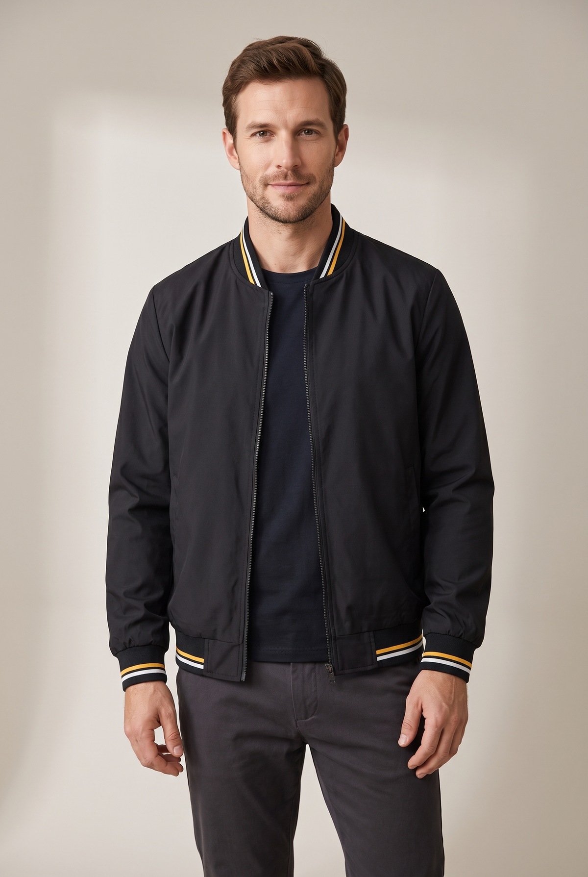 Men's Zip-Up Bomber Jacket with Ribbed Collar and Cuffs in Black, on model